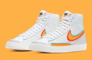A pair of white Nike Blazer sneakers.
